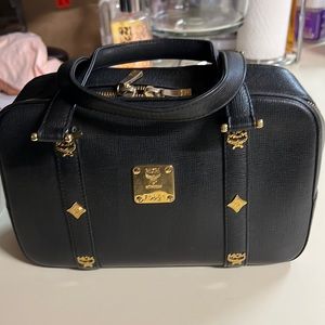 Authentic MCM in pristine condition. No cracks, no open pipe.